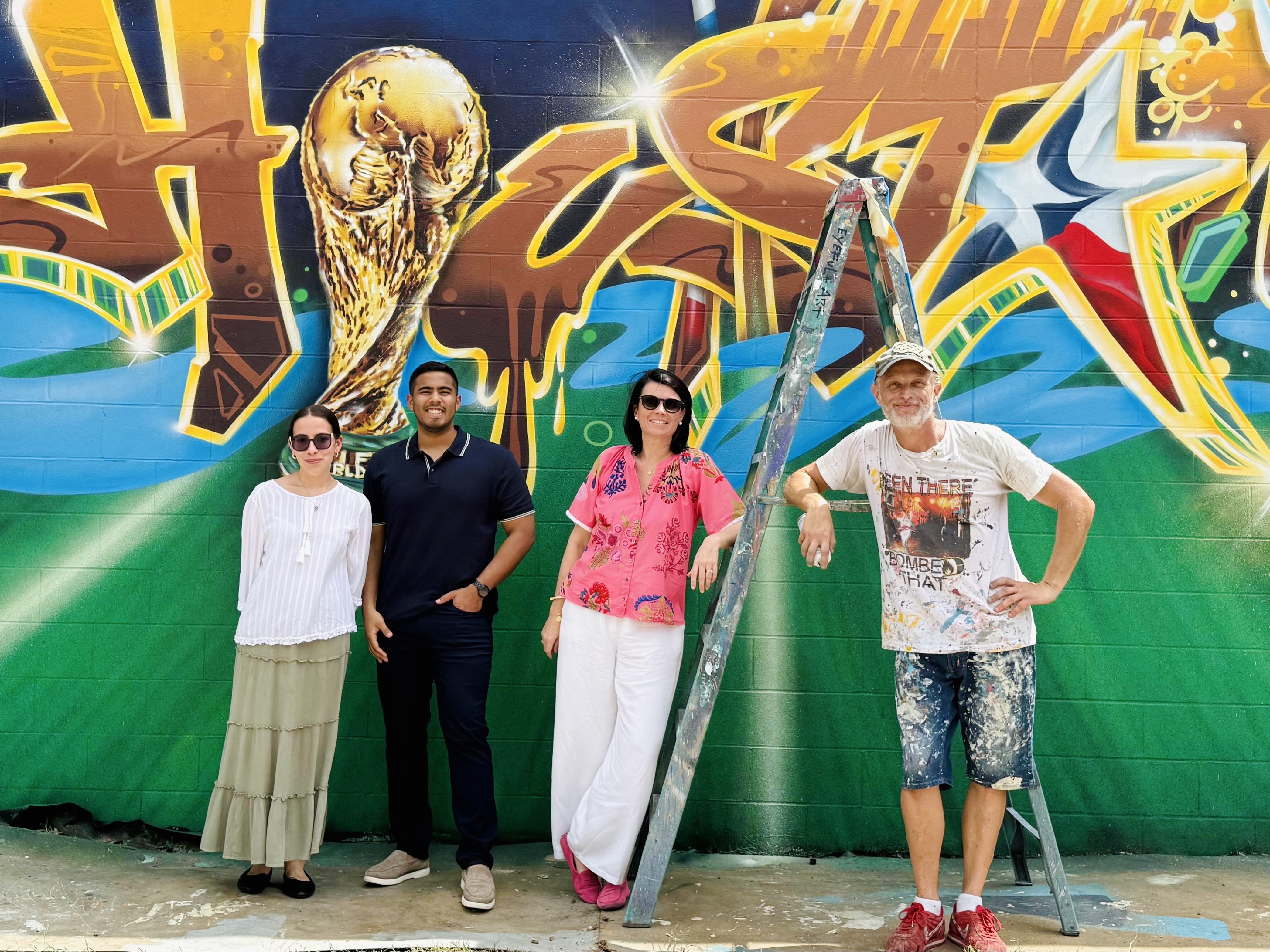 Sebastien "Mr. D1987" Boileau and his brand new mural, "The Bayou-tiful Game"